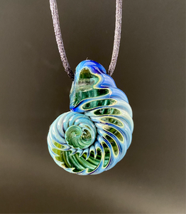 Ammonite pendant. (Deep sea)